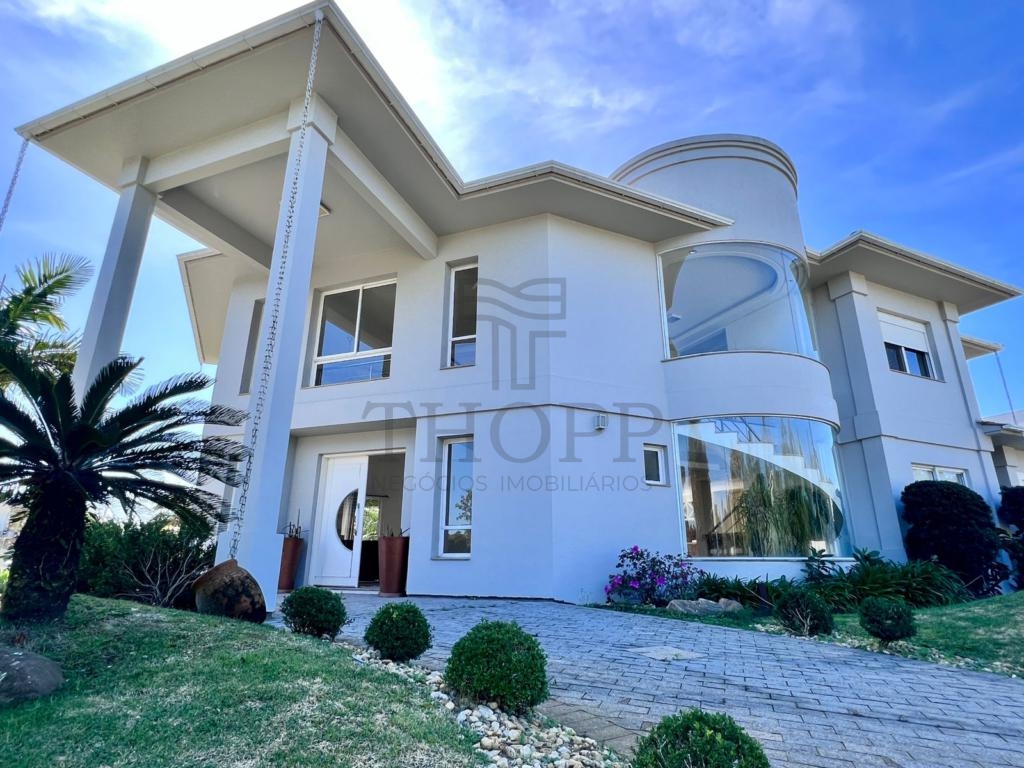 CASA EM CONDOMÍNIO 4 DORMITÓRIOS